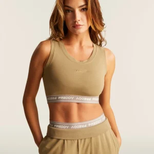 Top sportivo in heavy jersey stretch con elastico logato