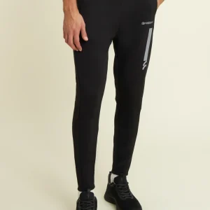 Pantaloni slim in tessuto tecnico con inserti mesh laterali