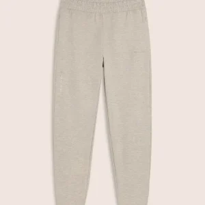 Pantaloni slim mélange con stampa trasparente e zip