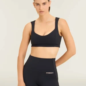 Top sportivo con scollo a cuore e dettagli tecnici