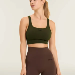 Top sportivo seamless supporto medio con inserti a costine