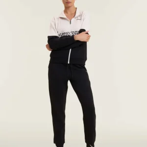 Tuta con zip e collo alto decorata da inserti animalier