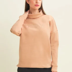 Tuta con collo risvoltabile e logo decorato da borchie