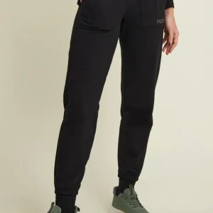 Pantaloni con fondo elasticizzato e tasche applicate