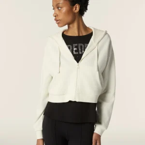 Felpa corta oversize con zip e cappuccio decorato da ricamo