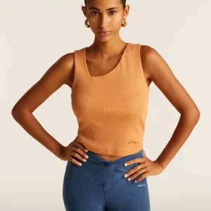 Top a costine stretch con scollo asimmetrico