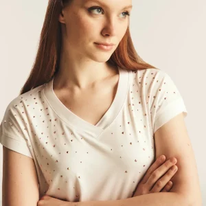 T-shirt in jersey viscosa con borchie e scollo a V