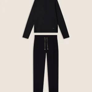 Tuta donna con zip, collo alto e dettagli animalier