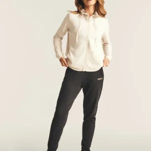 Tuta interlock con zip e collo alto interno fantasia