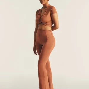 Pantaloni WR.UP flare vita alta in cotone con impunture